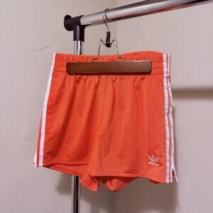 Adidas Women's Orange Athletic Shorts with White Stripes
